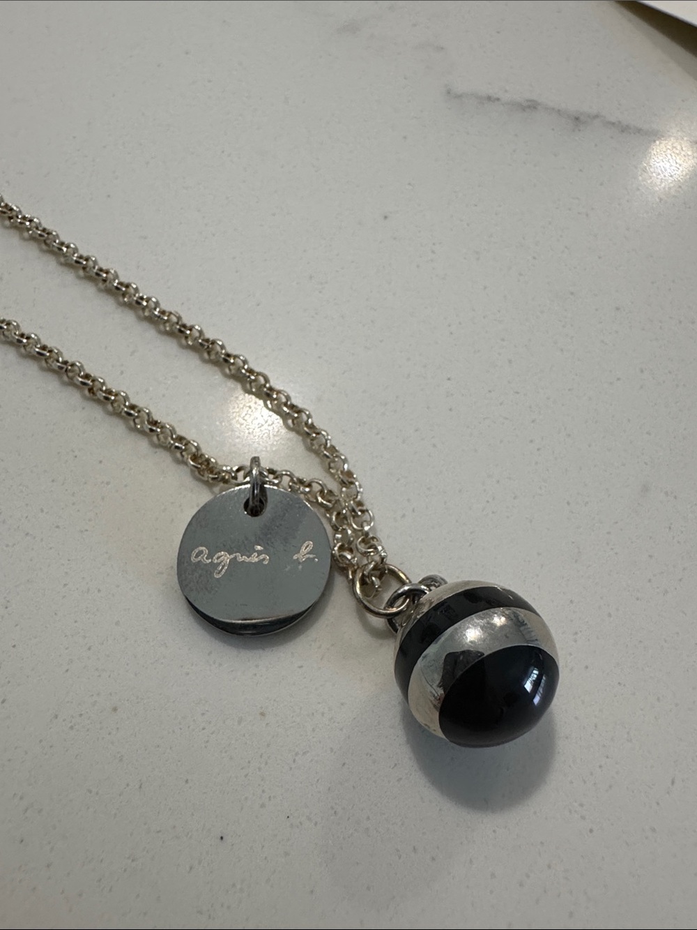 Agnes B. Silver-Tone Necklace with Black Globe Pendant